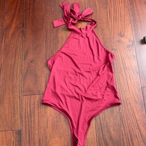 Made in china . Size M  . Color dark red